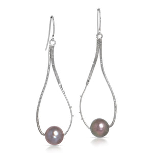 Argentium Sterling and grey pearls. Available with different stones (turquoise, jasper). Pierced dangles. 2 ¼” high x ⅝” wide
