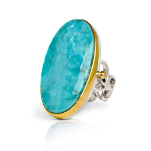 Beautiful natural Kingman Turquoise set in 18kt Gold bezel. Ring band is fused argentium droplets with 18kt Gold accents on sides.  The large turquoise stone is 1 1/4" x 3/4"  size 6 1/2 | O'Hara Studios